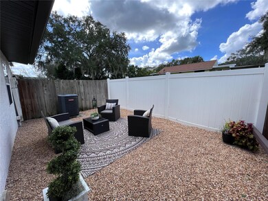 fenced-in back yard, perfect outdoor oasis for relaxing and entertaining.