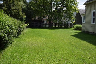 Side yard looking toward rear fence.
