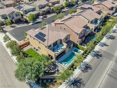 Aerial view of residential area featuring a pool area, balcony with mountain views and fully paid off solar panels. NO neighbor behind!