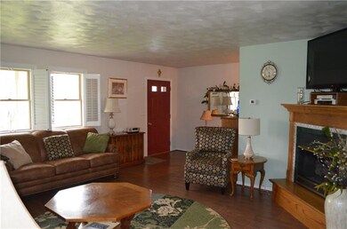 Living Room with Corner Fireplace