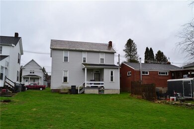 Rear of home, Flat back yard with room to add on o