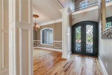 Entrance with beautiful double metal front doors..