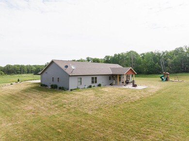 Rear view of home and Patio