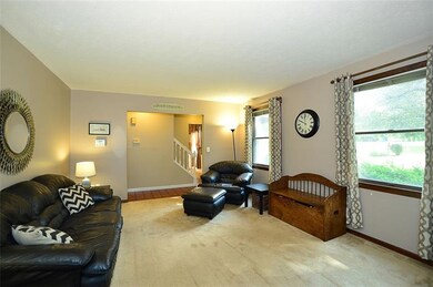 2nd view of Living Room shows ceramic tile entrywa
