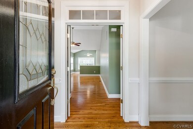 Foyer can be closed off with glass French doors