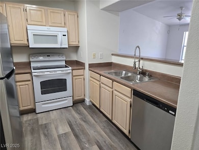 Kitchen featuring stainless steel appliances, ligh