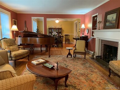 Living Room Opens to Dining Room.
