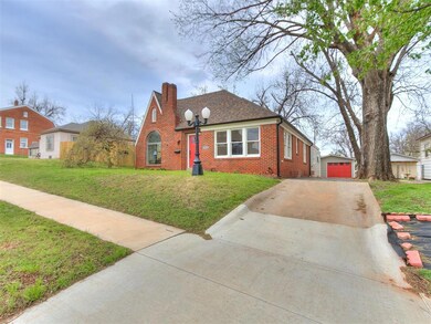 View of front of property with a front lawn