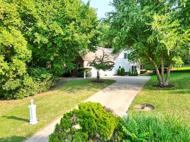 Lush Front Lawn and Driveway