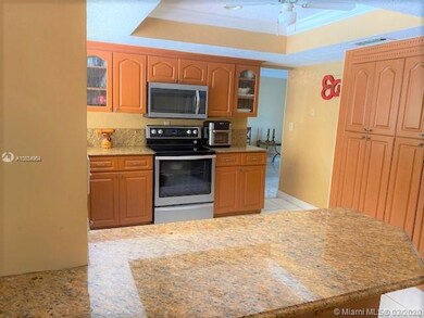 The kitchen has a countertop to be used as a side 