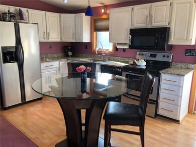 This Kitchen Offers Ample Storage And Walks Out To