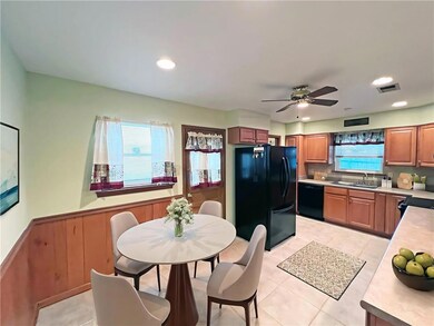 Kitchen is virtually staged.