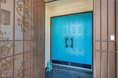 Doorway to property featuring board and batten siding