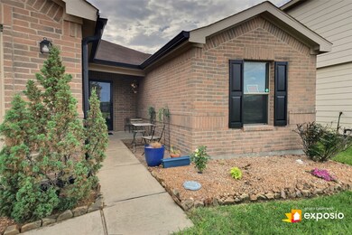 Easy, drought tolerant landscaping with a cute front porch to have your morning coffee