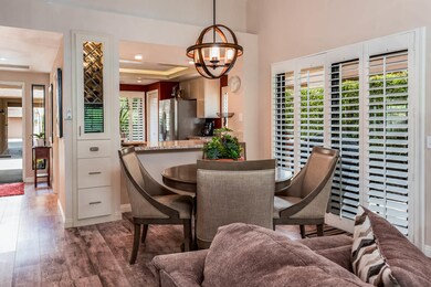 dining area lookin g aback to front door