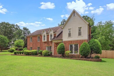 View of front of property with a front lawn