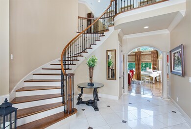 Grand Entry Foyer with marble & granite inlay, 2-story domed ceiling with chandelier lift