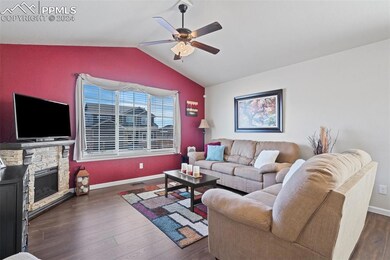 Living room featuring dark hardwood / wood-style f
