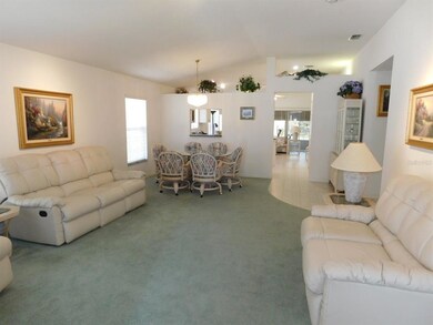 Living Room/Dining area with plant shelf
