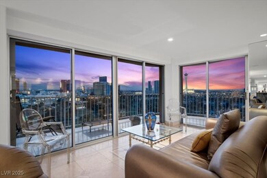 Living room with floor to ceiling windows, light t