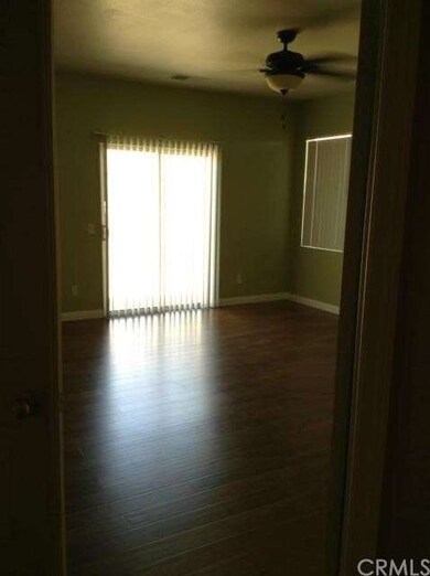 Large master bedroom with ceiling fan, huge walk-i