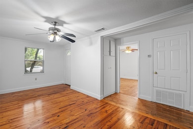 Spare room with light wood finished floors, ceili