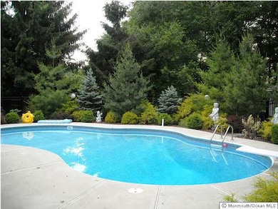 496 Tennent Rd, Morganville, NJ 07751 - photo 2