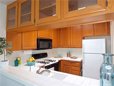 Breakfast bar keeps the kitchen bright and airy