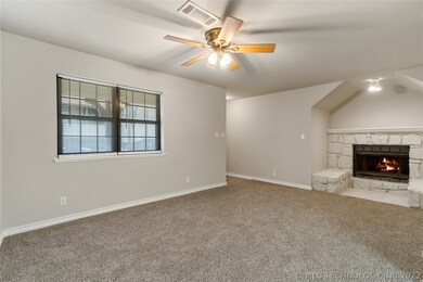 Spacious Living Room with a Fireplace