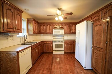 1609 Tyler Dr, Raymore, MO 64083 - photo 5