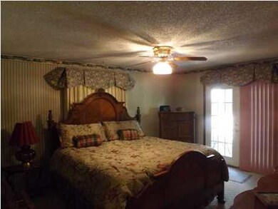 Master suite with walkin closet, shower, and walk-