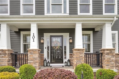 ENTRY INTO THE HOUSE FROM THE INVITING FRONT PORCH