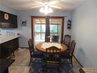 Dining Area With Patio Door Leading To Covered Dec