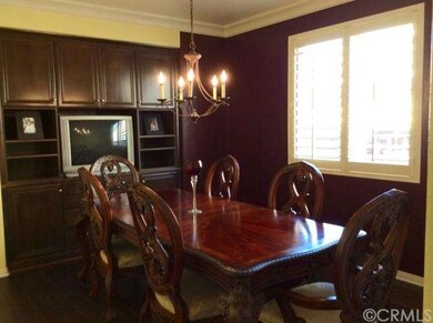 Formal Dining Area with Built-in China Cabinets