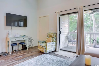 Doorway featuring LVP-type flooring