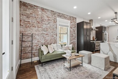 Living room w/ Exposed brick