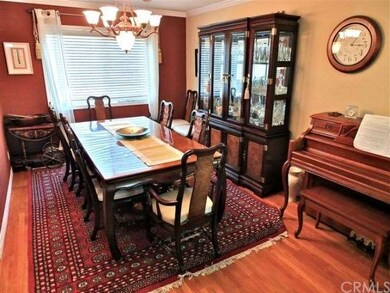 Dining room view 2 with large window and crown mol