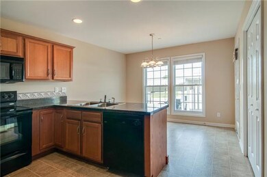 Opens to breakfast nook for morning coffee by the windows in the sun! |