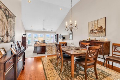 Dining area featuring high vaulted ceiling, recess