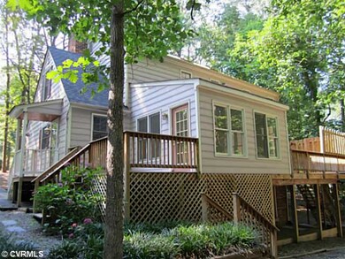 Exterior Back - View of back showing Sunroom and d