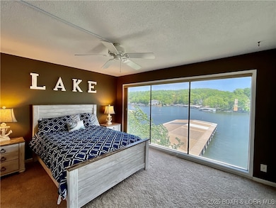 Master suite with floor to ceiling windows