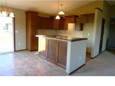 KITCHEN AREA WITH EATING BAR