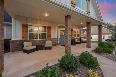 Patio terrace at dusk featuring a porch