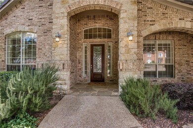 Unique brick and rock combination with front porch