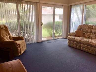 Sunroom overlooks large lot