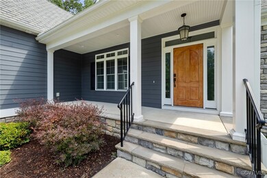 Property entrance with covered porch