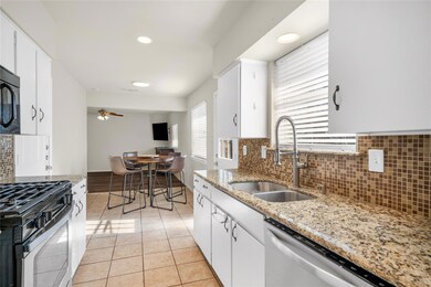 Kitchen featuring appliances with stainless steel 