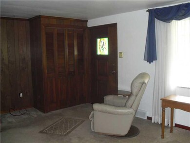 Living Room. There is a large coat closet in the l