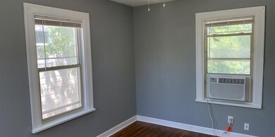 Spare room featuring cooling unit, a wealth of nat