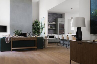 Living area with light wood-style floors